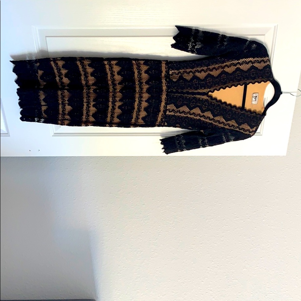 Black /nude lace dress never worn like new.